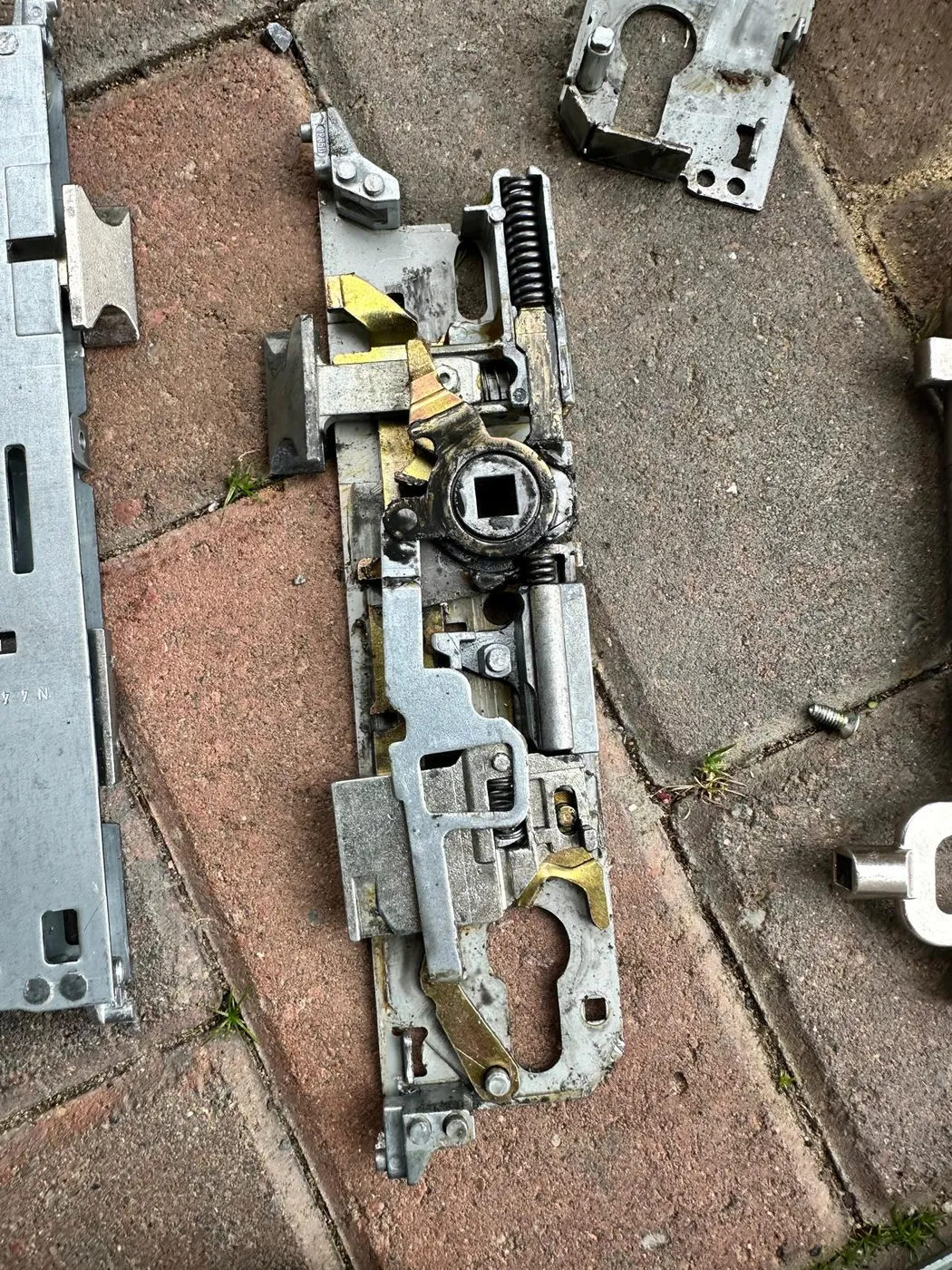 A worn uPVC gearbox stripped on the driveway during a real call-out — the unfiltered work the reviews describe