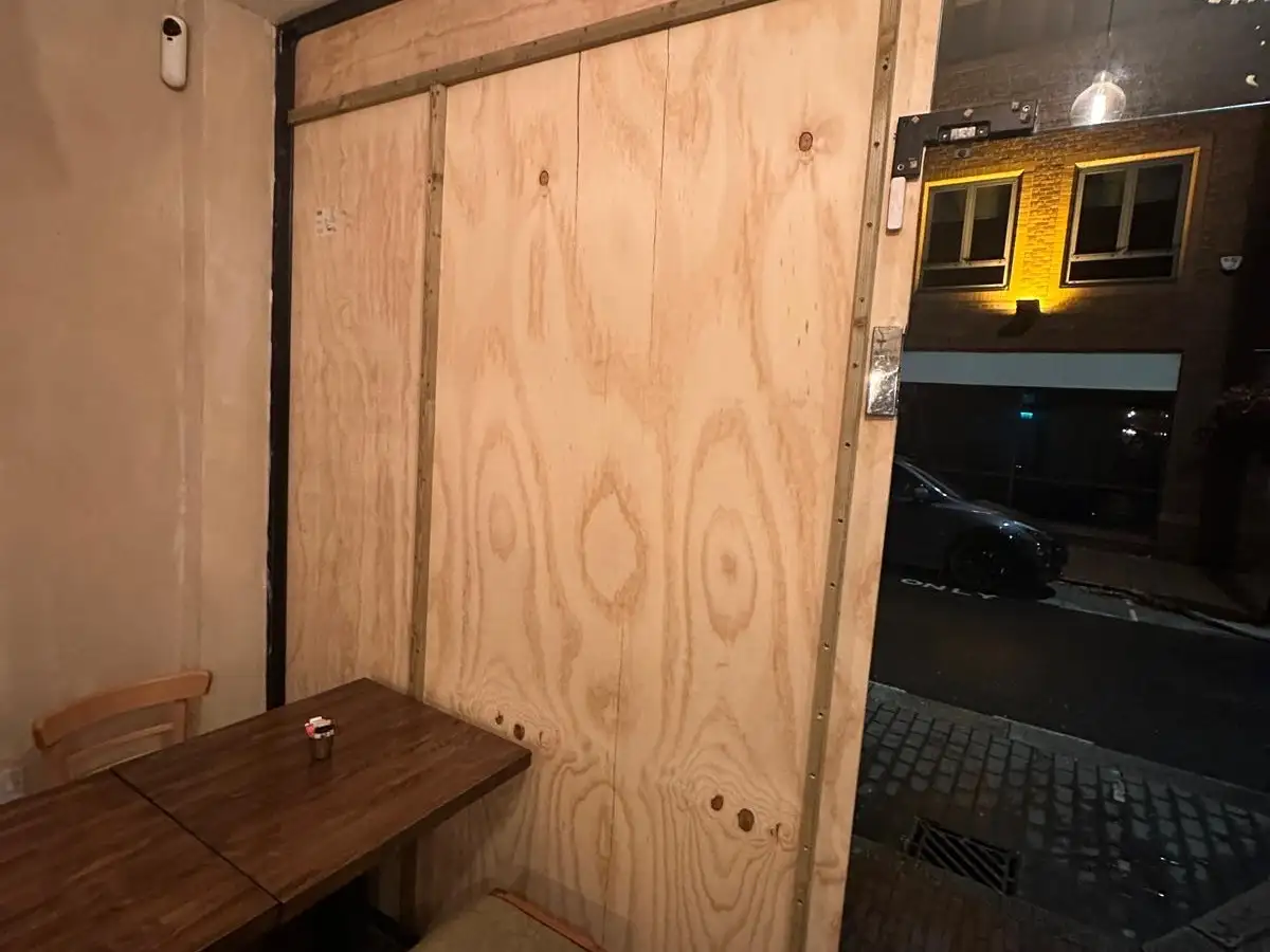 A Shopfront Boarded Before Morning image 1